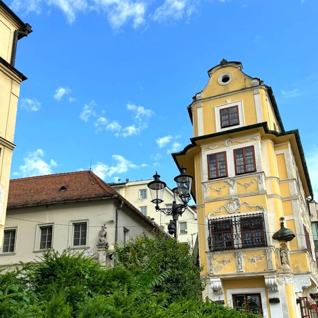 House of the Good Shepherd in Bratislava Old Town – historic yellow rococo building near Bratislava Castle, popular stop on Bratislava City Tours walking tours.