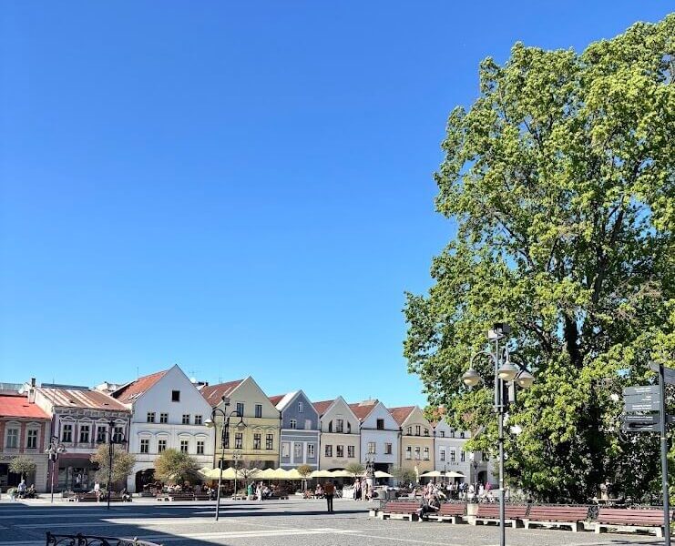Mariánske Square in Žilina with colourful historic facades on a sunny day — full-day trip from Bratislava to North Slovakia