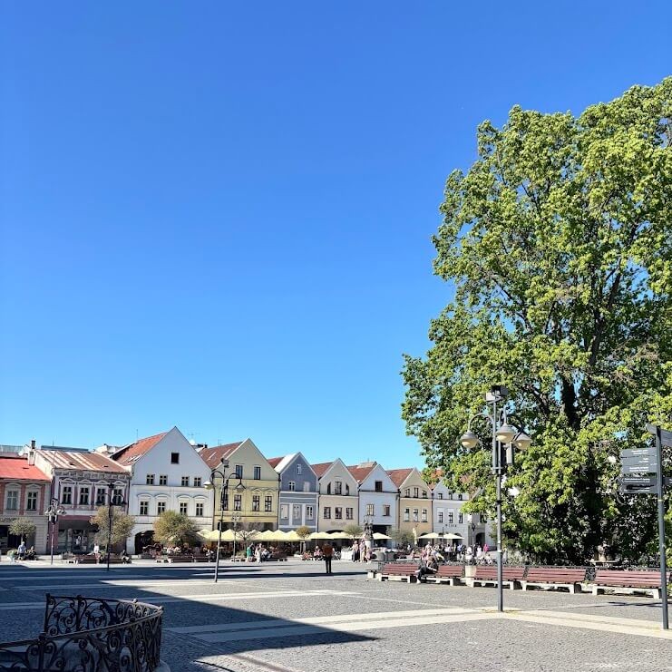 Mariánske Square in Žilina with colourful historic facades on a sunny day — full-day trip from Bratislava to North Slovakia
