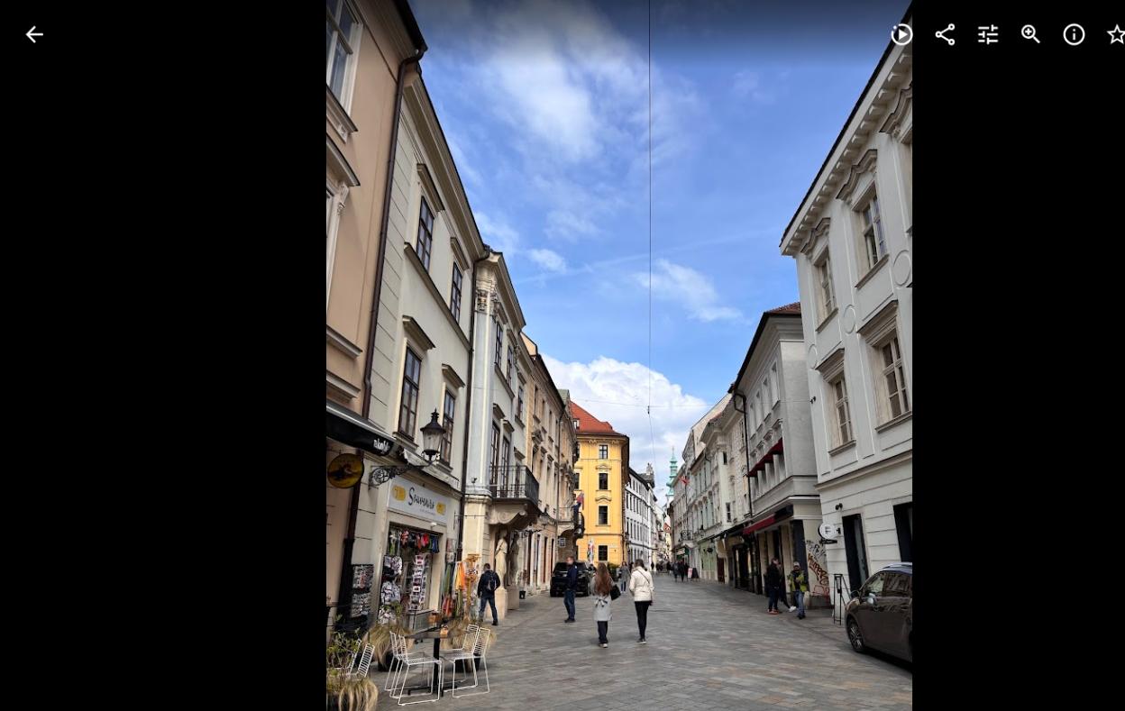 Bratislava Old Town pedestrian street with historic Habsburg-era buildings — a highlight of visiting Bratislava before taking the train to Budapest